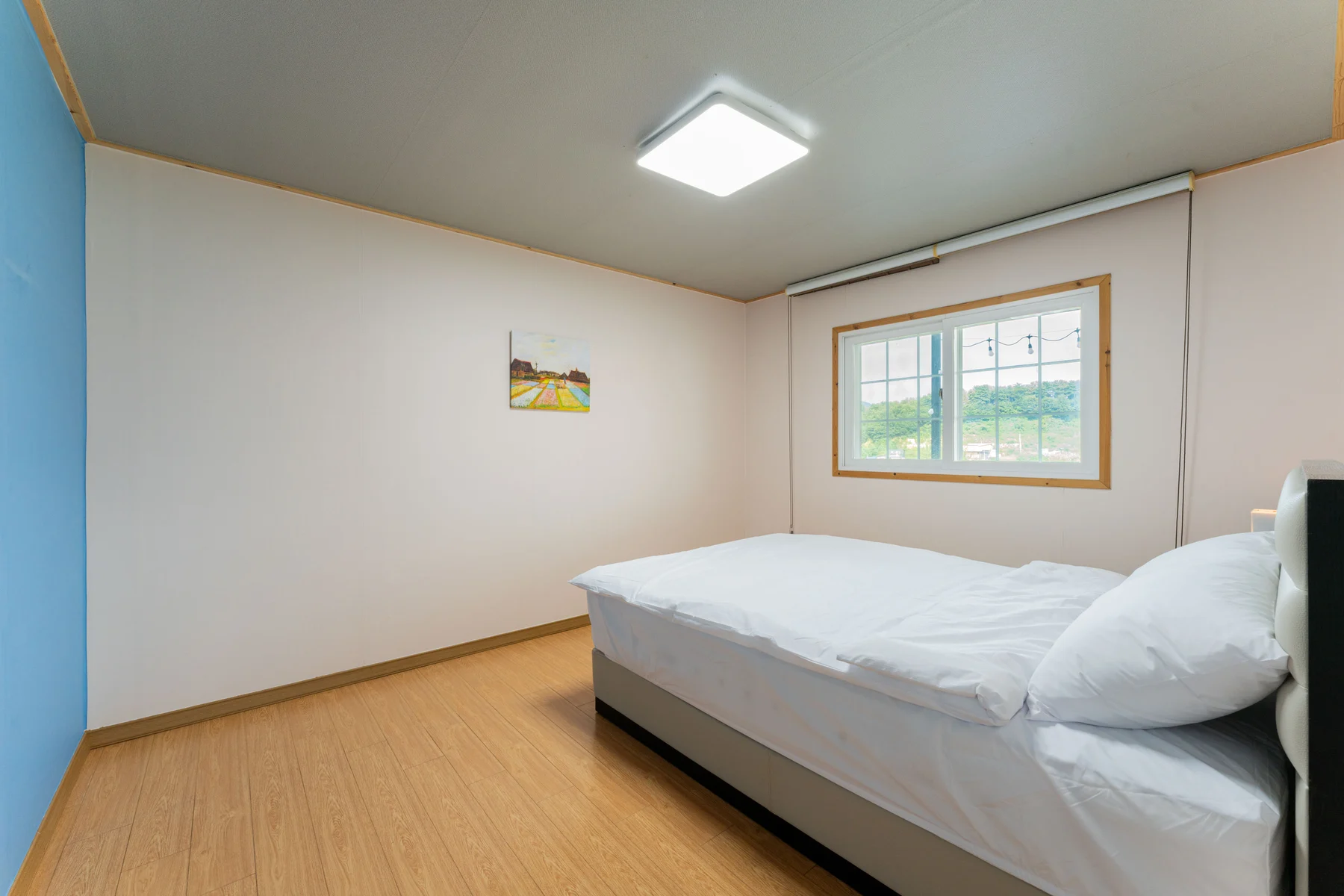 Bedroom with a bed and window